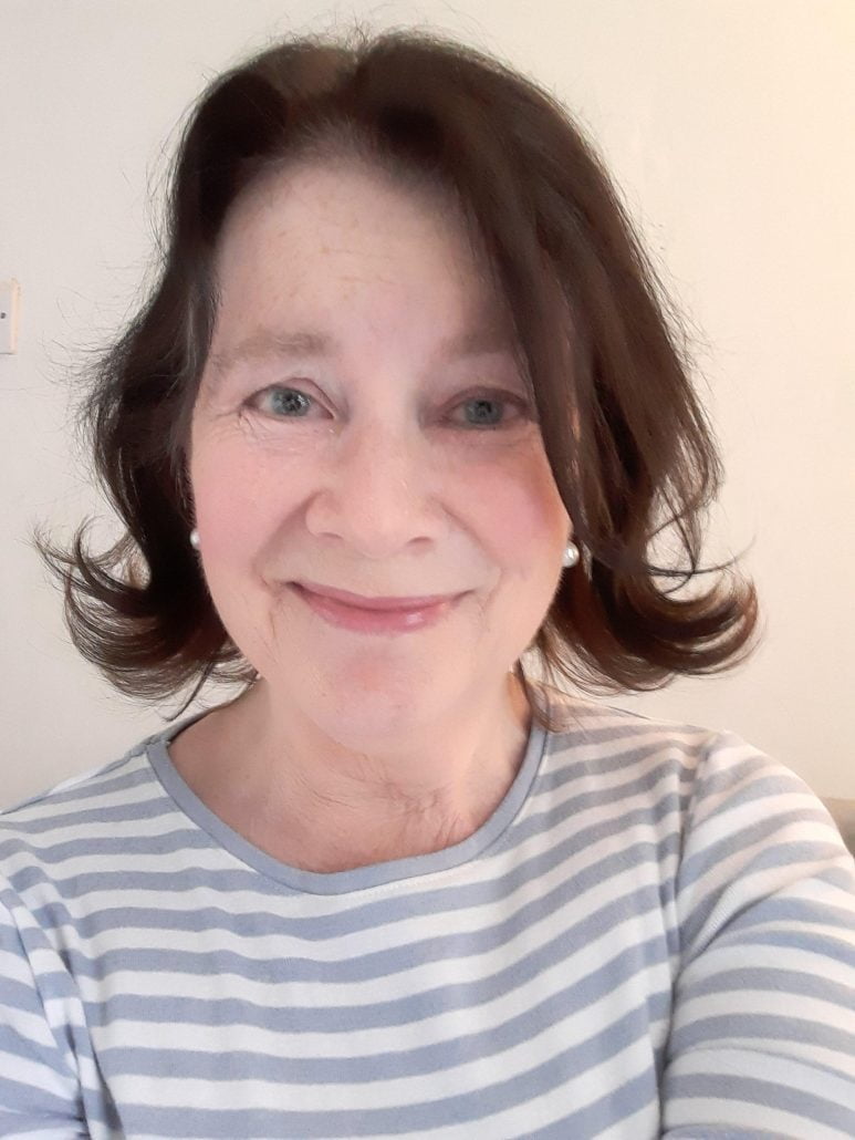Image shows Lili Cunnigham wearing a light blue stripey top