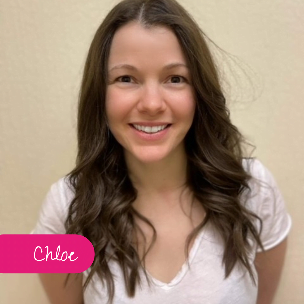 Image shows Chloe smiling to camera in a head and shoulders shot