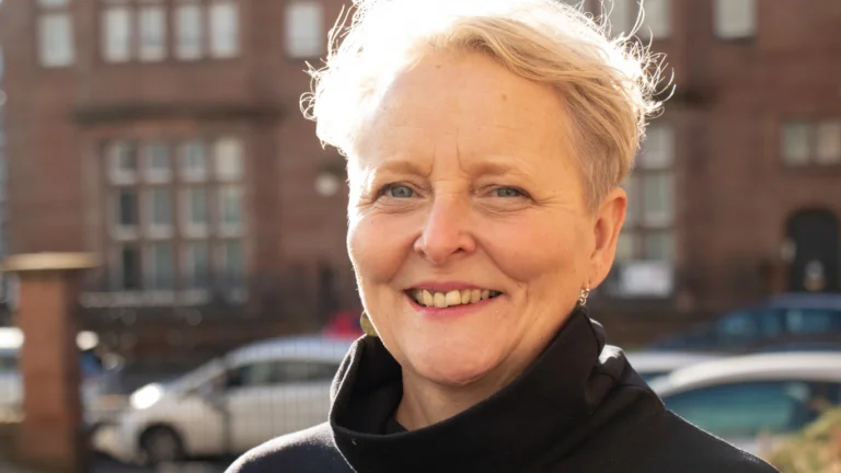 image shows the rather fabulous jane smiling to camera. Jane is our director of programmes