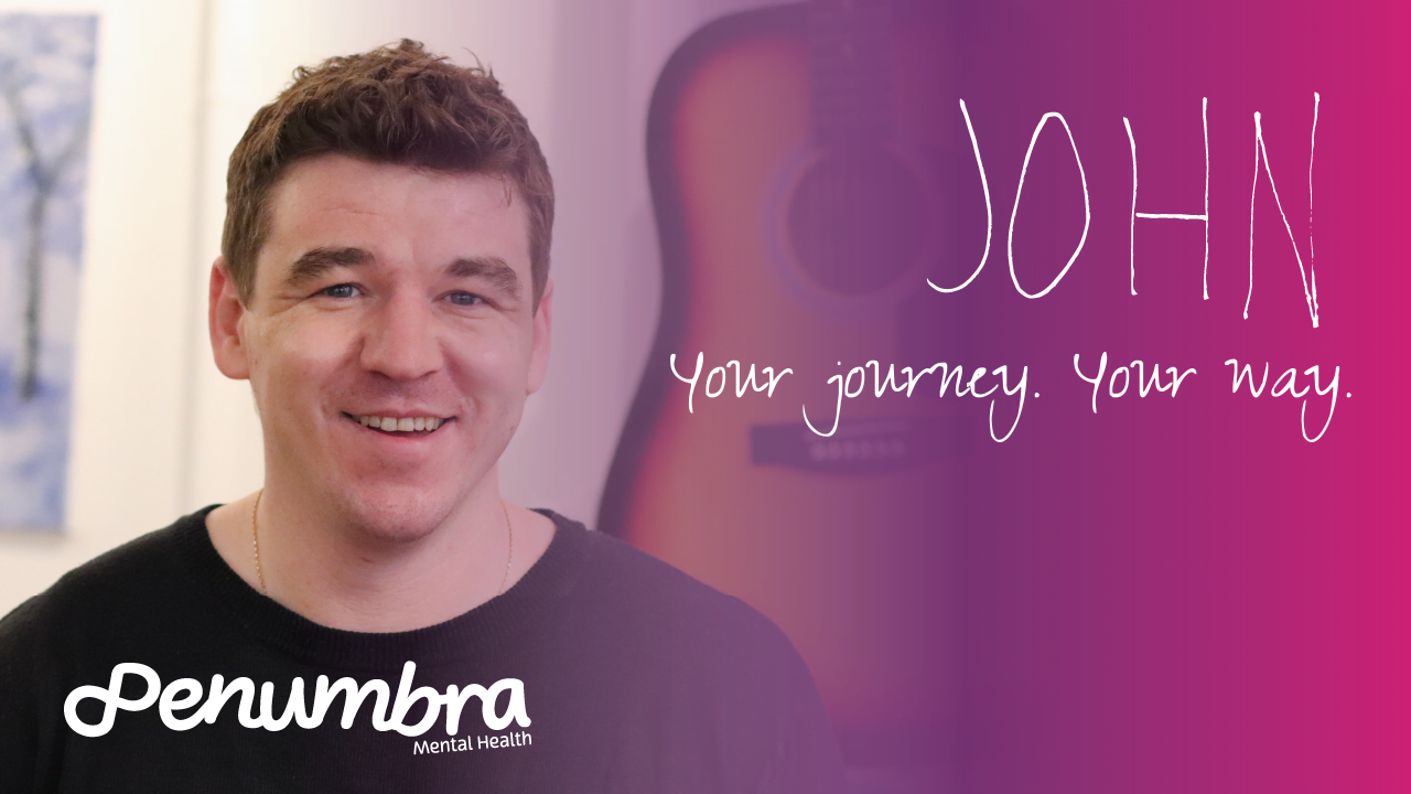 image shows john smiling to camera