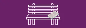 Illustration of a bench and an open book.
